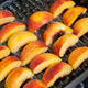Peach slices on a grill
